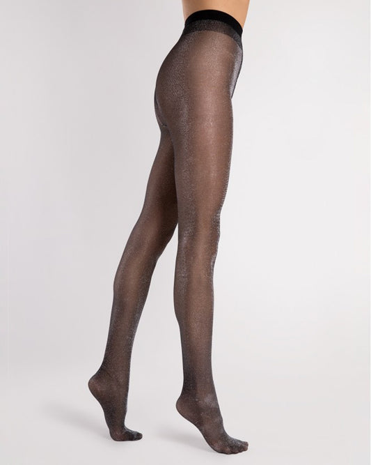 Black sheer tights with silver sparkly lamé worn by a person on a white background