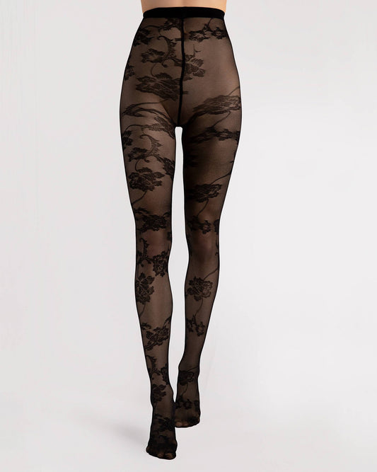 Fiore Wild Dream 30 Den - Sheer black floral lace patterned tights with an open buttoned effect rear seam. Front view.