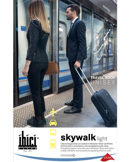 packaging for skywalk light travel sock with a man and woman at a train station.