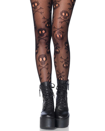 Black fishnet tights with a repeating skull and crossbones pattern, shown on a model's legs paired with black lace-up platform ankle boots against a white background.