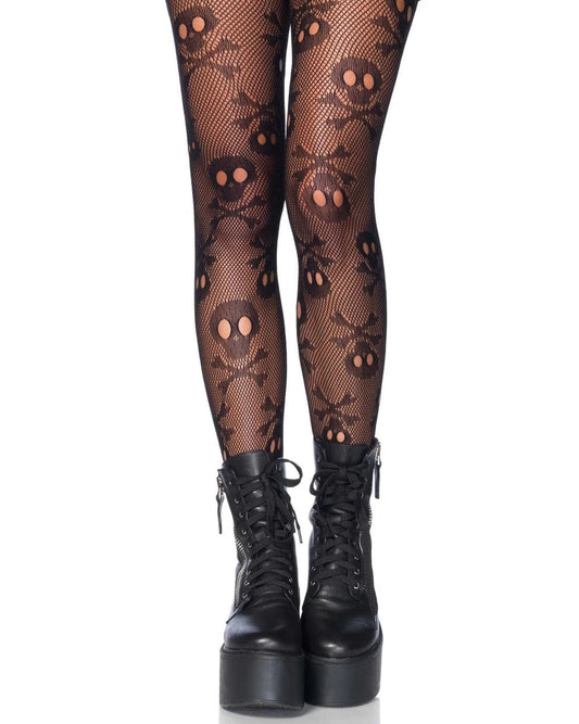 Black fishnet tights with a repeating skull and crossbones pattern, shown on a model's legs paired with black lace-up platform ankle boots against a white background.