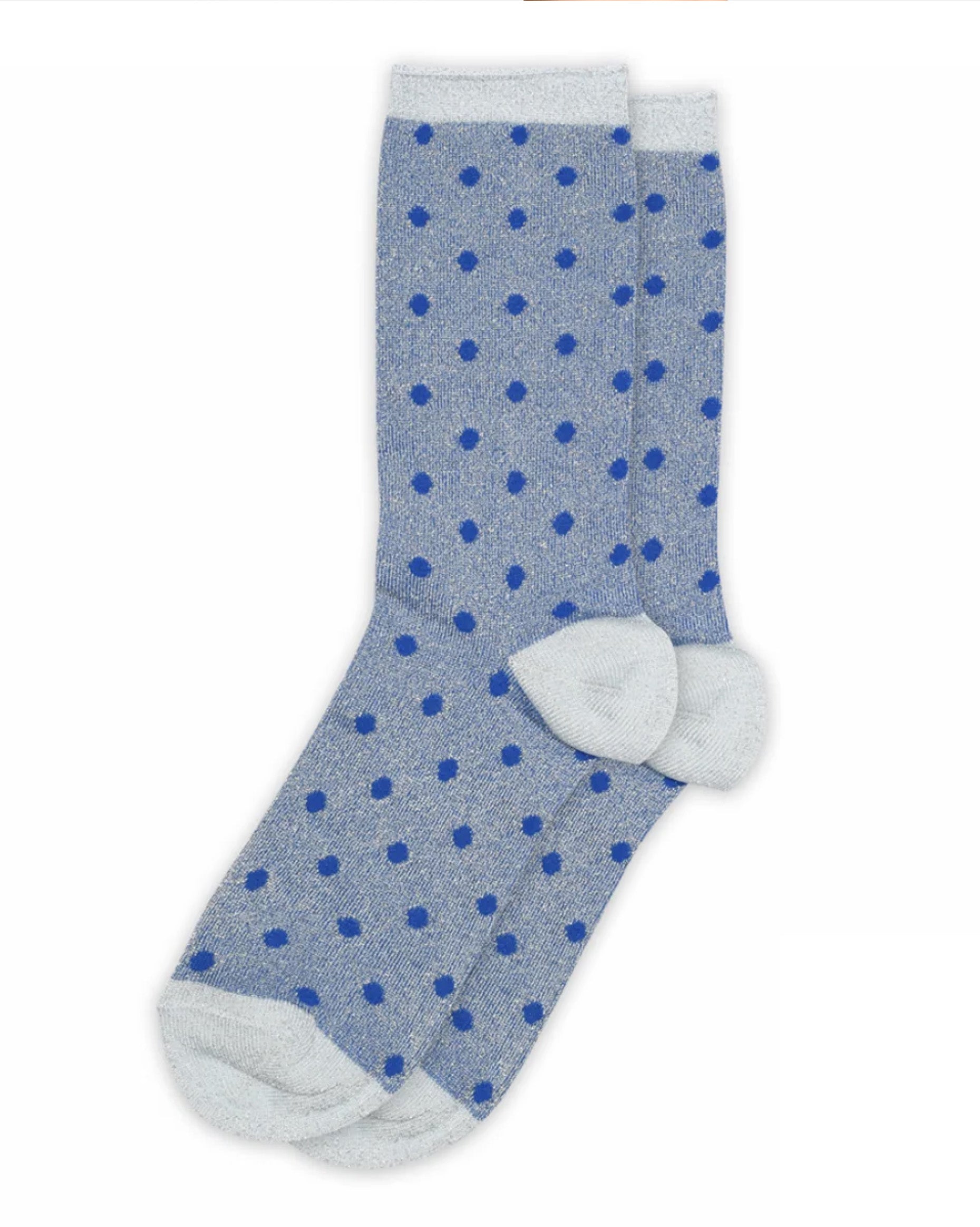Blue socks with white polka dots on a white background