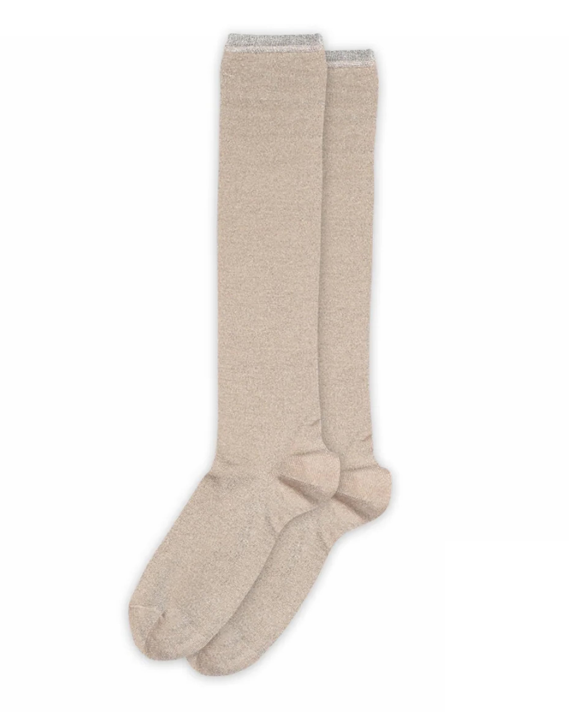 Pair of sparkly beige knee-high socks on a white background