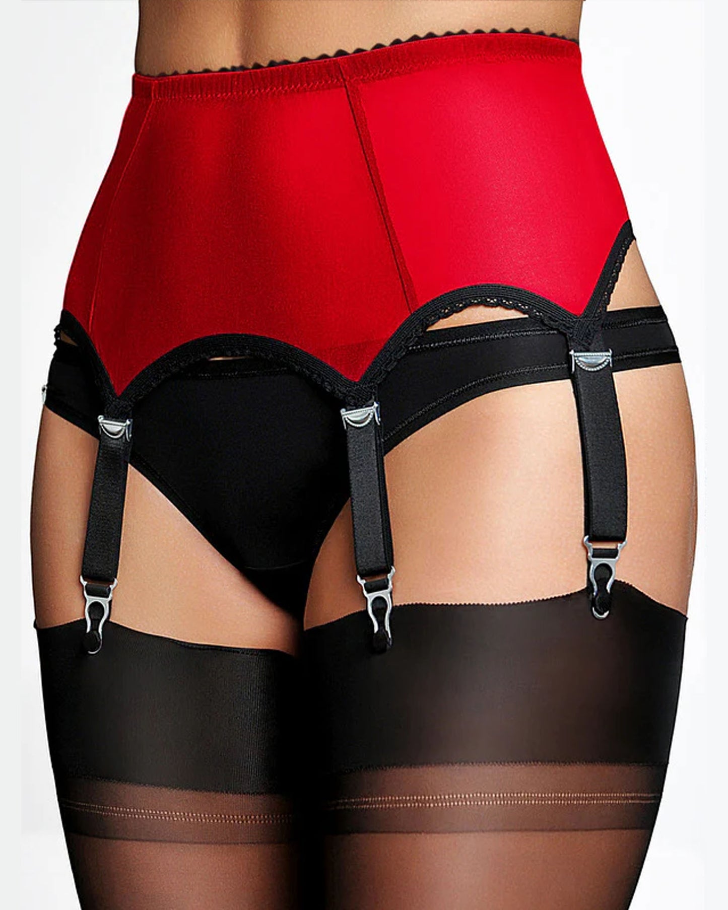 Classic red high waisted micro tulle garter belt with thick straps and metal clasps, worn with sheer black stockings..