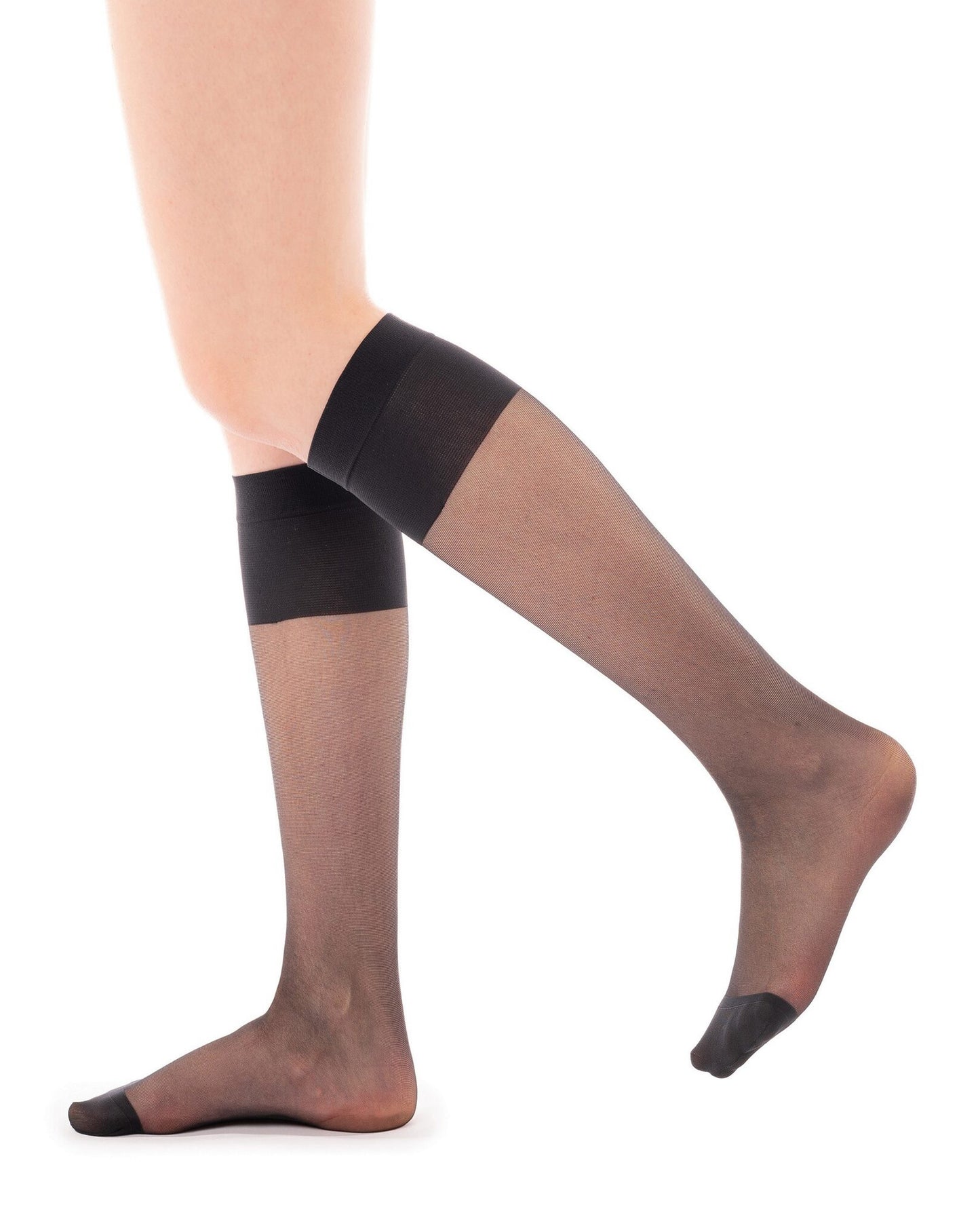 Sheer black knee-high socks with sheer design worn by a person on a white background
