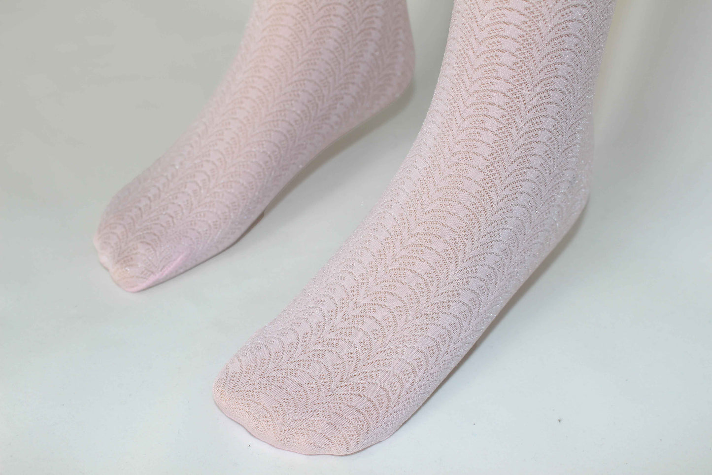 Omsa Serenella Delice Collant - Light baby pink / rosa semi opaque Kid's fashion tights with a woven circular linear lace style pattern.