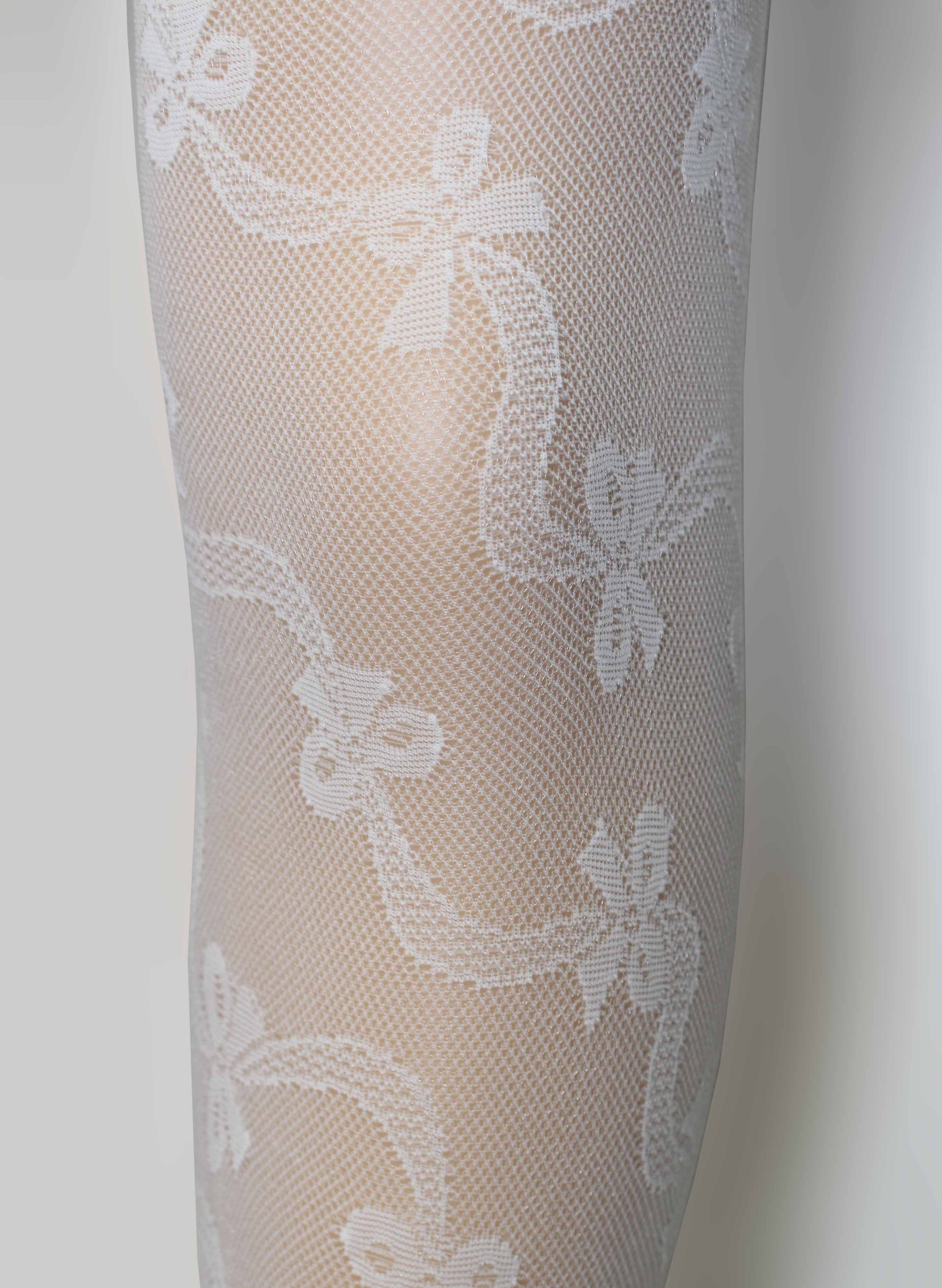 Omsa Serenella Gala Tights - White semi opaque kid's fashion tights with a woven ribbon and bow style pattern, perfect for communions and weddings