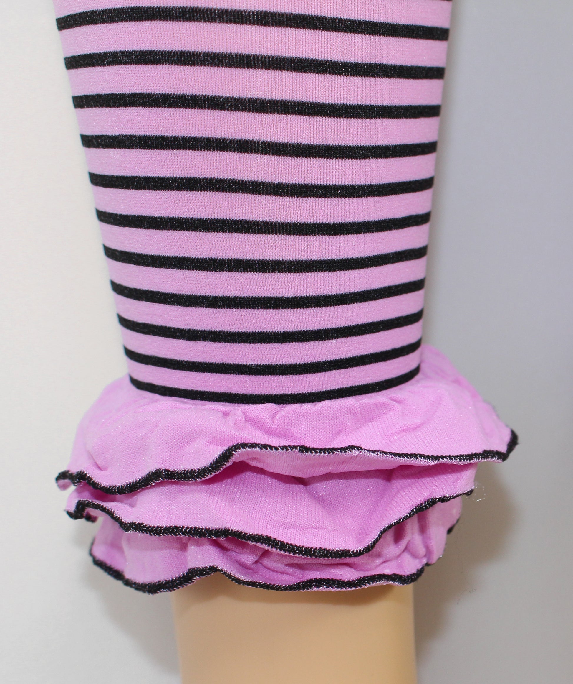 Omsa St. Tropez Pantacollant - Soft mauve pink opaque kid's footless tights with a black horizontal stripe pattern and frilly ruched cuff.