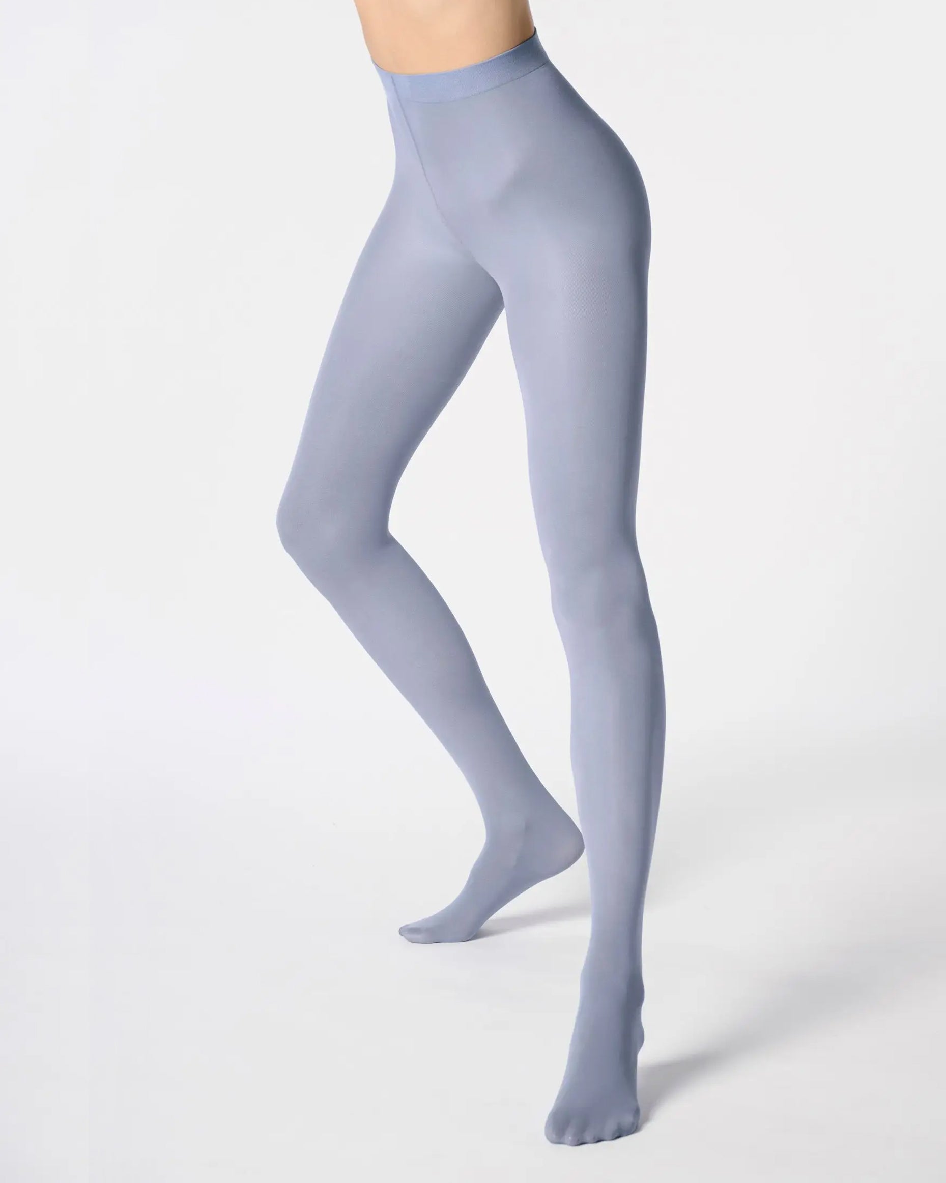 Light blue tights worn by a person on a white background