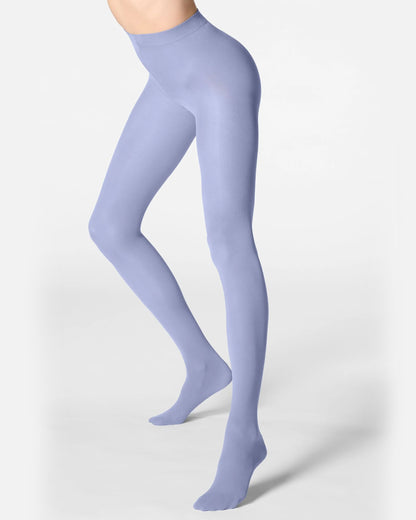 Light blue grey tights worn by a person on a white background