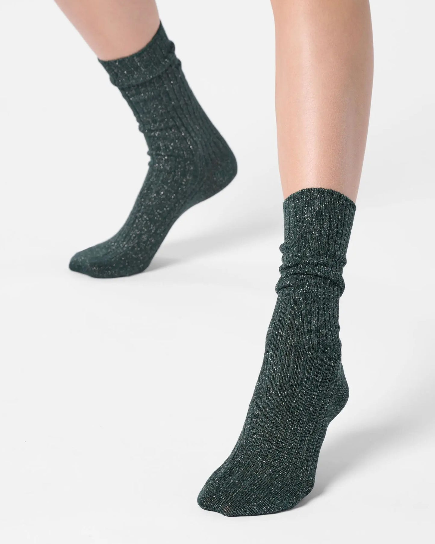 Dark green ribbed scrunched ankle socks with sparkly silver lamé 