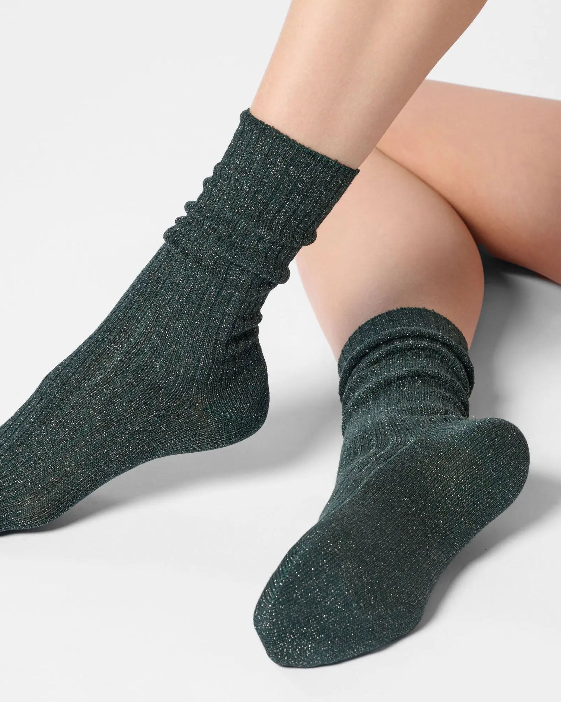 Dark green ribbed scrunched ankle socks with sparkly silver lamé 
