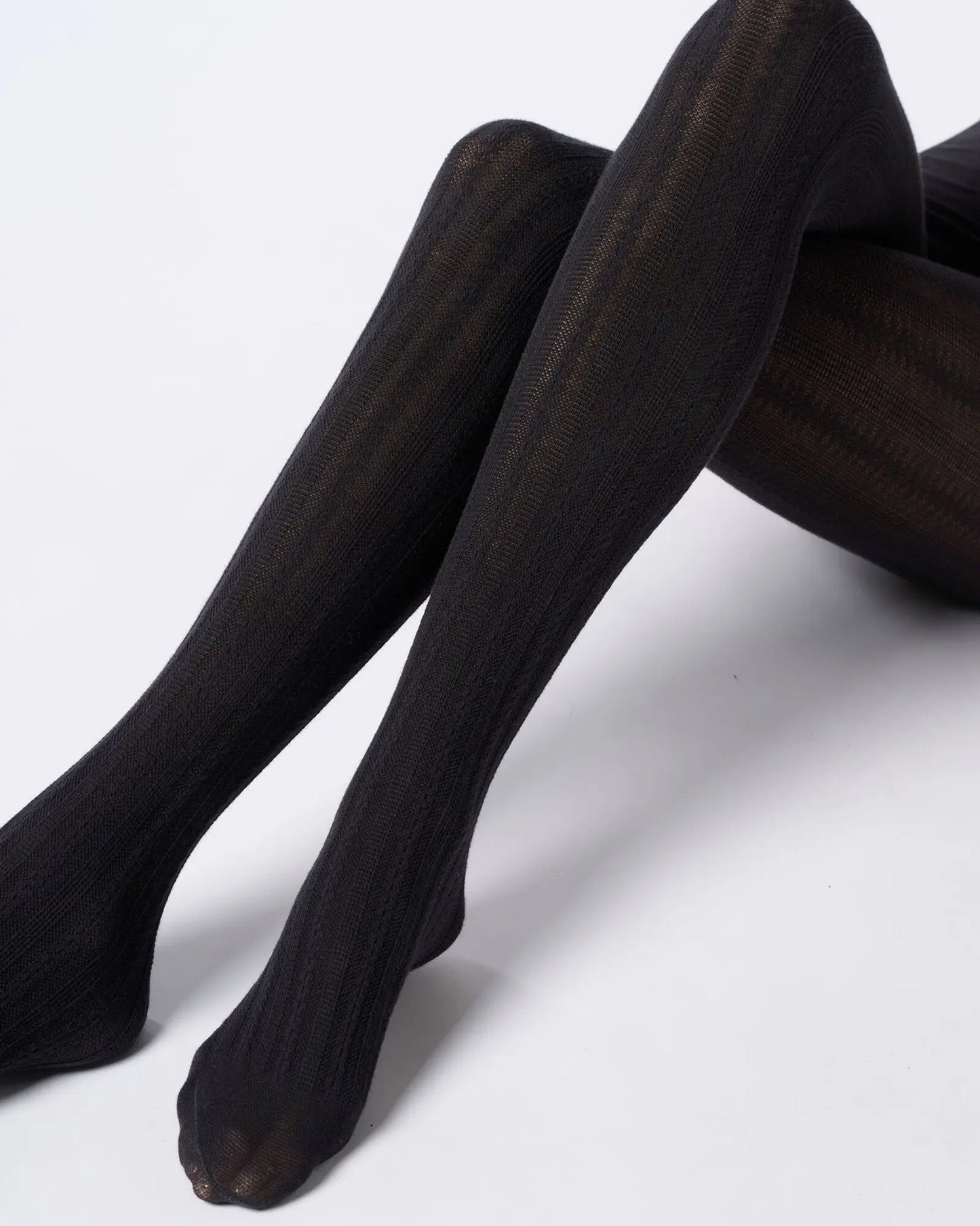 Black knitted cotton socks with a geometric stripe cable design