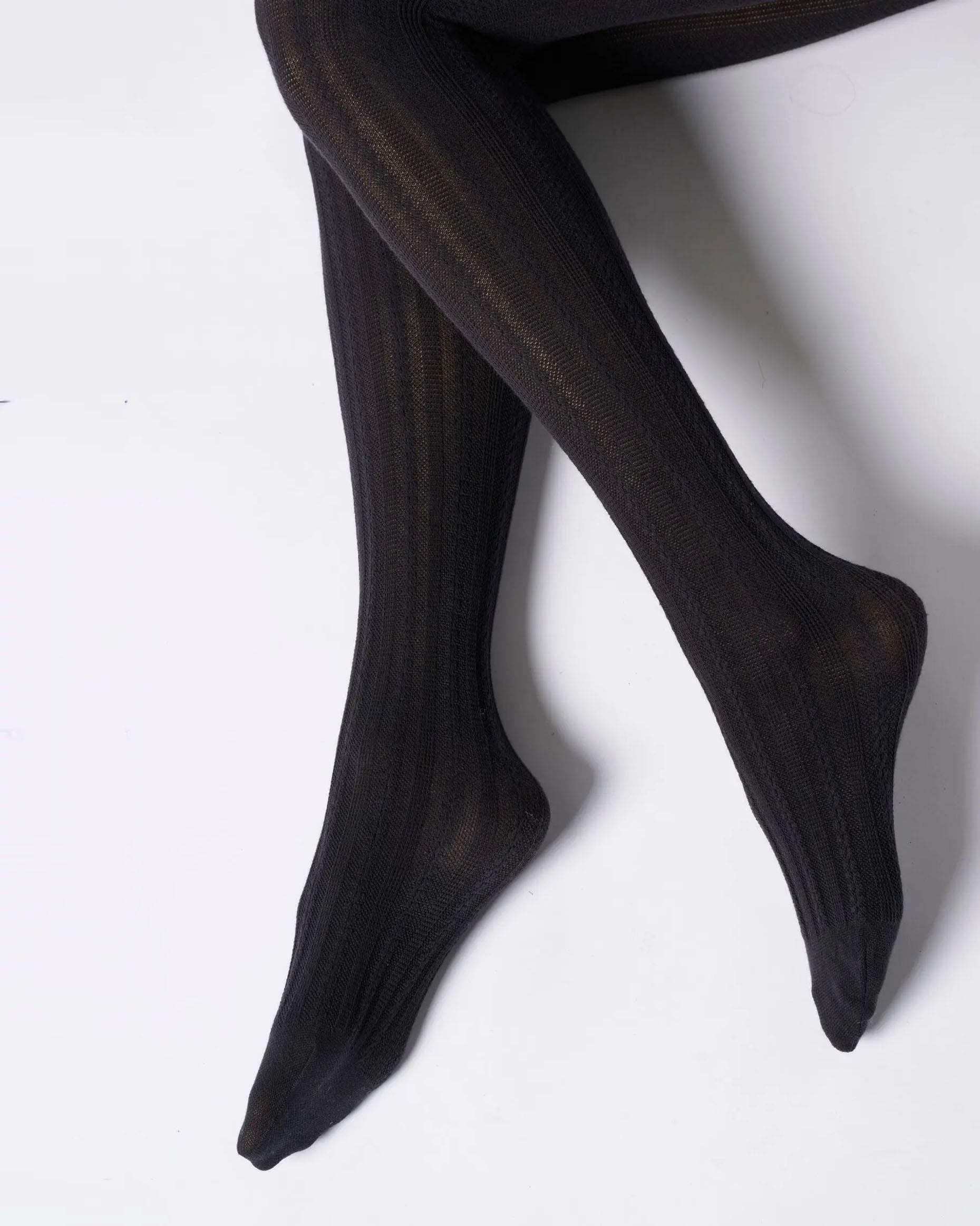 Black knitted cotton socks with a geometric stripe cable design