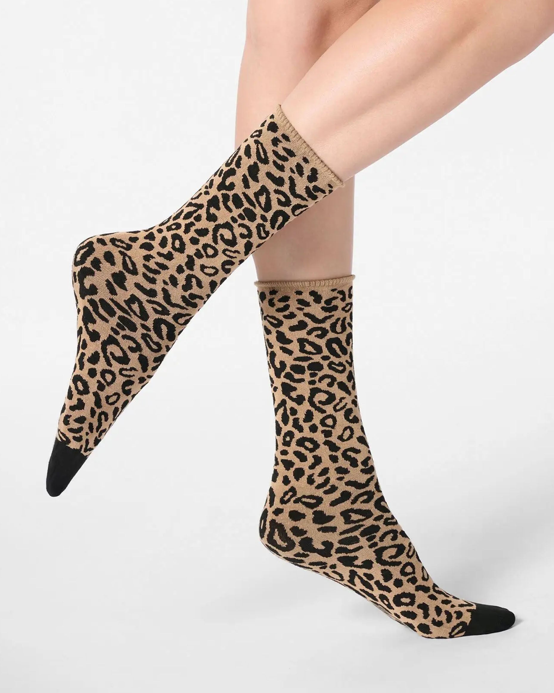 beige ankle socks with a black leopard print pattern