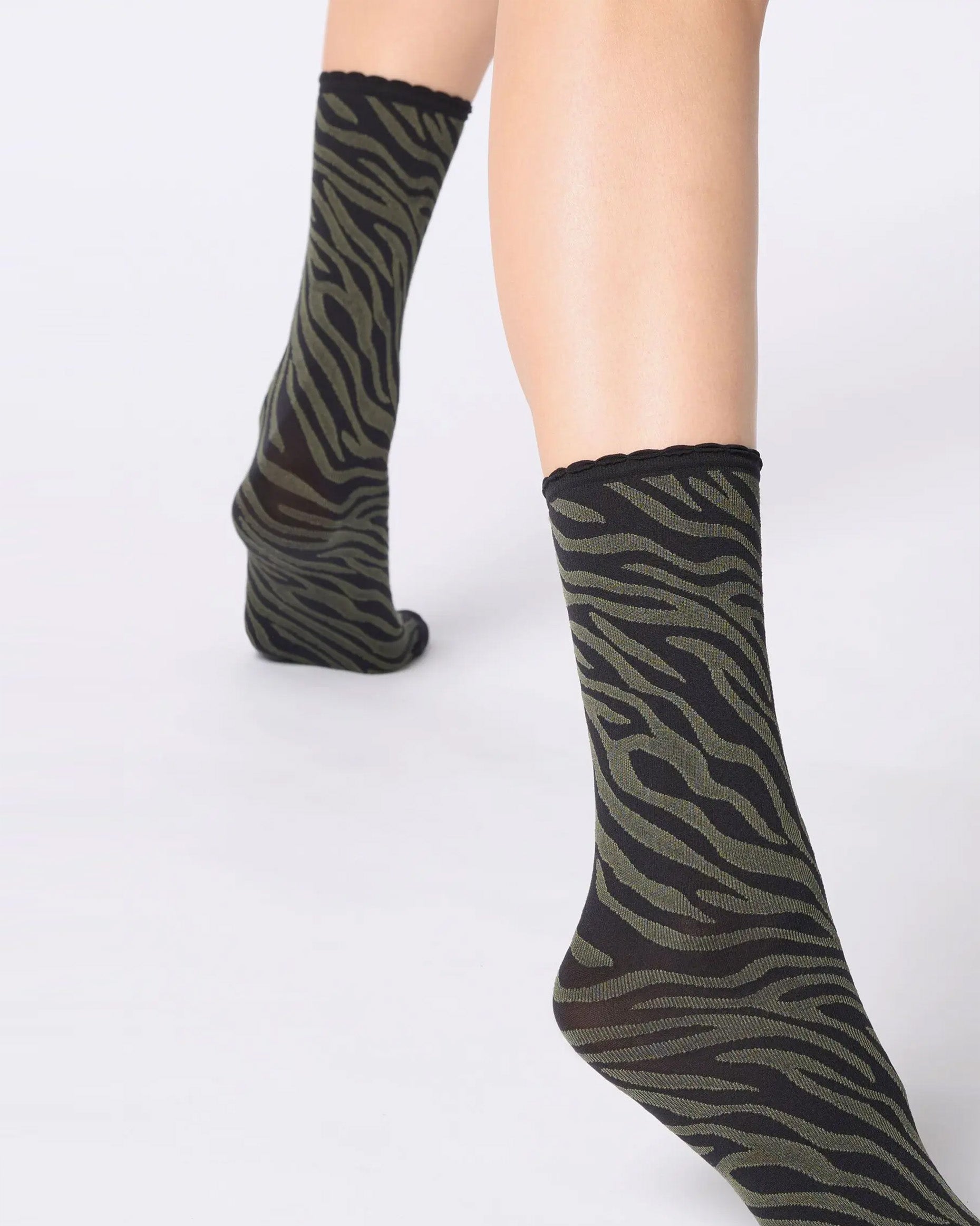 Black and khaki green zebra print ankle socks.