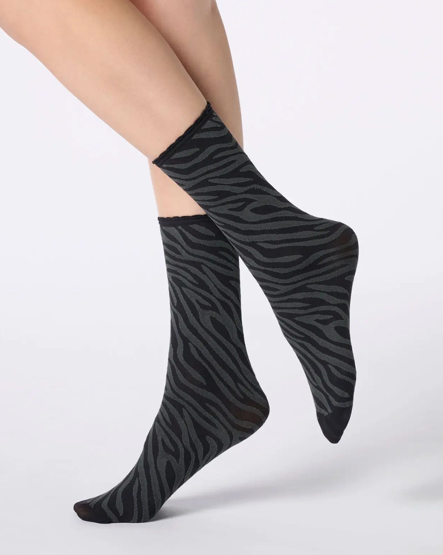 Black and grey zebra print ankle socks.