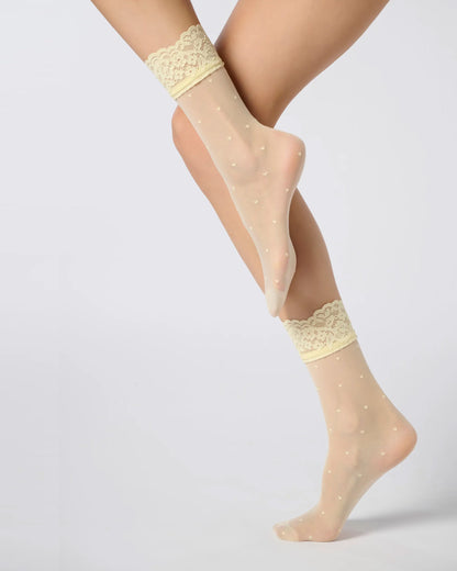 Oroblù Sweetie Calzino - Sheer pastel yellow fashion ankle socks with an all over dotted heart pattern and floral lace cuff.