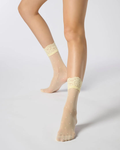 Oroblù Sweetie Calzino - Sheer pale yellow fashion ankle socks with an all over dotted heart pattern and floral lace cuff and reinforced toe.