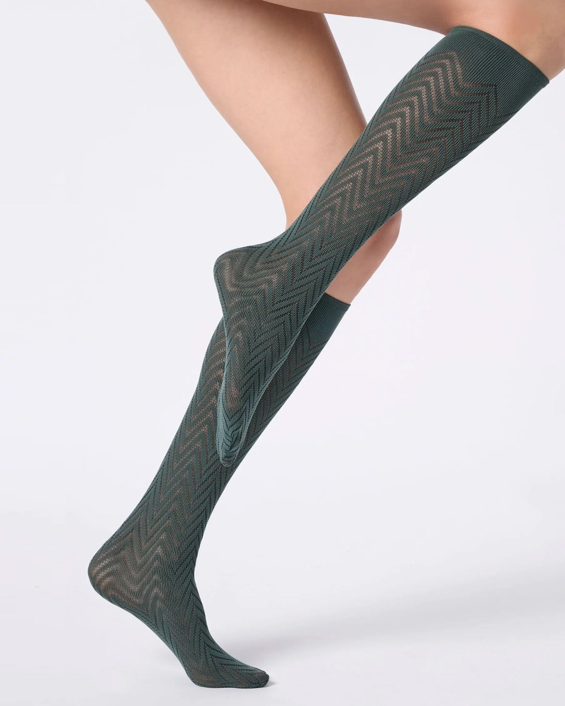 Dark green opaque knee-high socks with a chevron pattern.