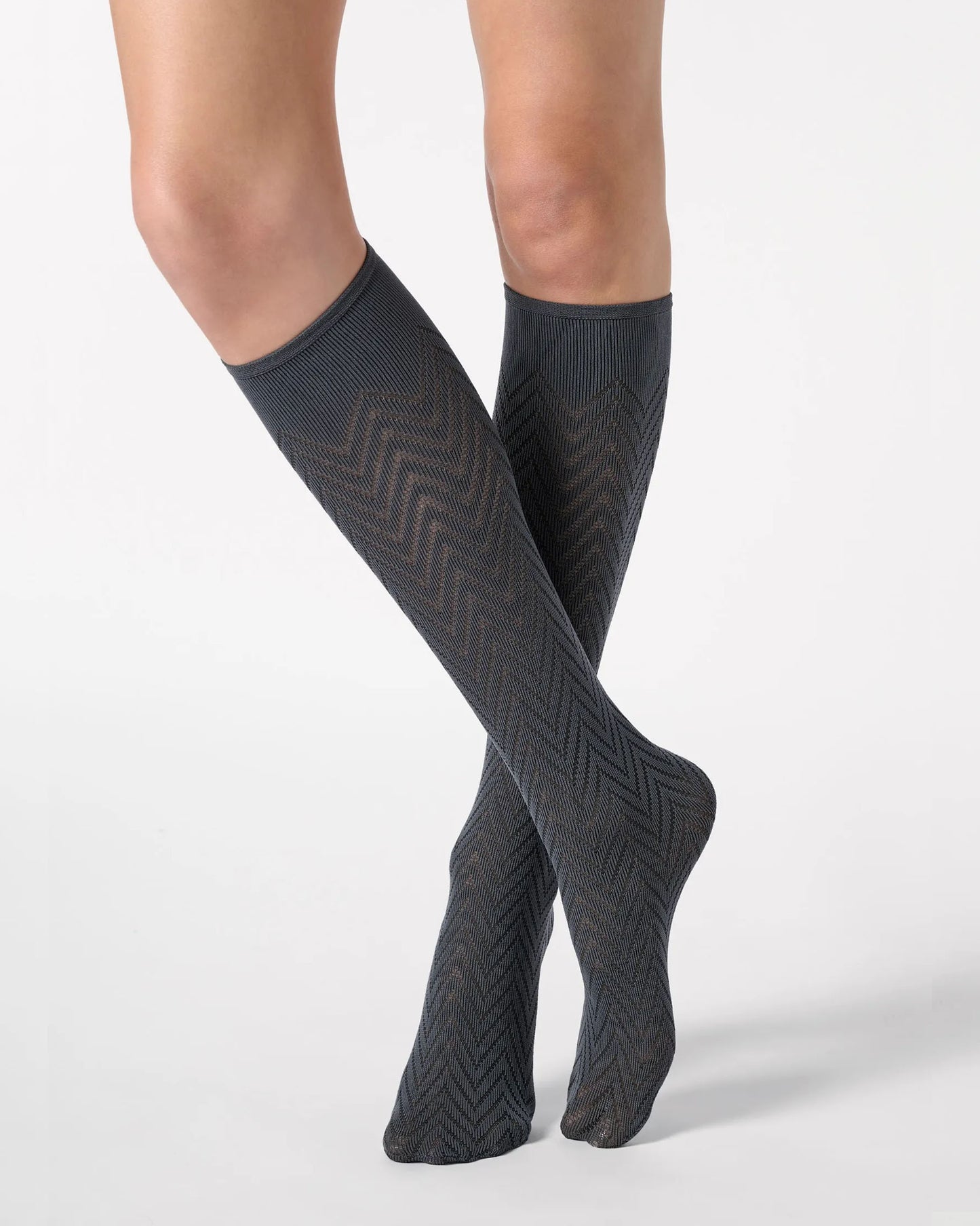 Dark grey opaque knee-high socks with a zig-zag pattern.