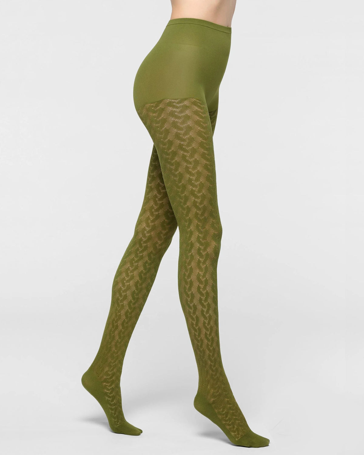Olive green tights with a textured chevron knit pattern, shown on a model's legs from a side profile view against a light gray background.