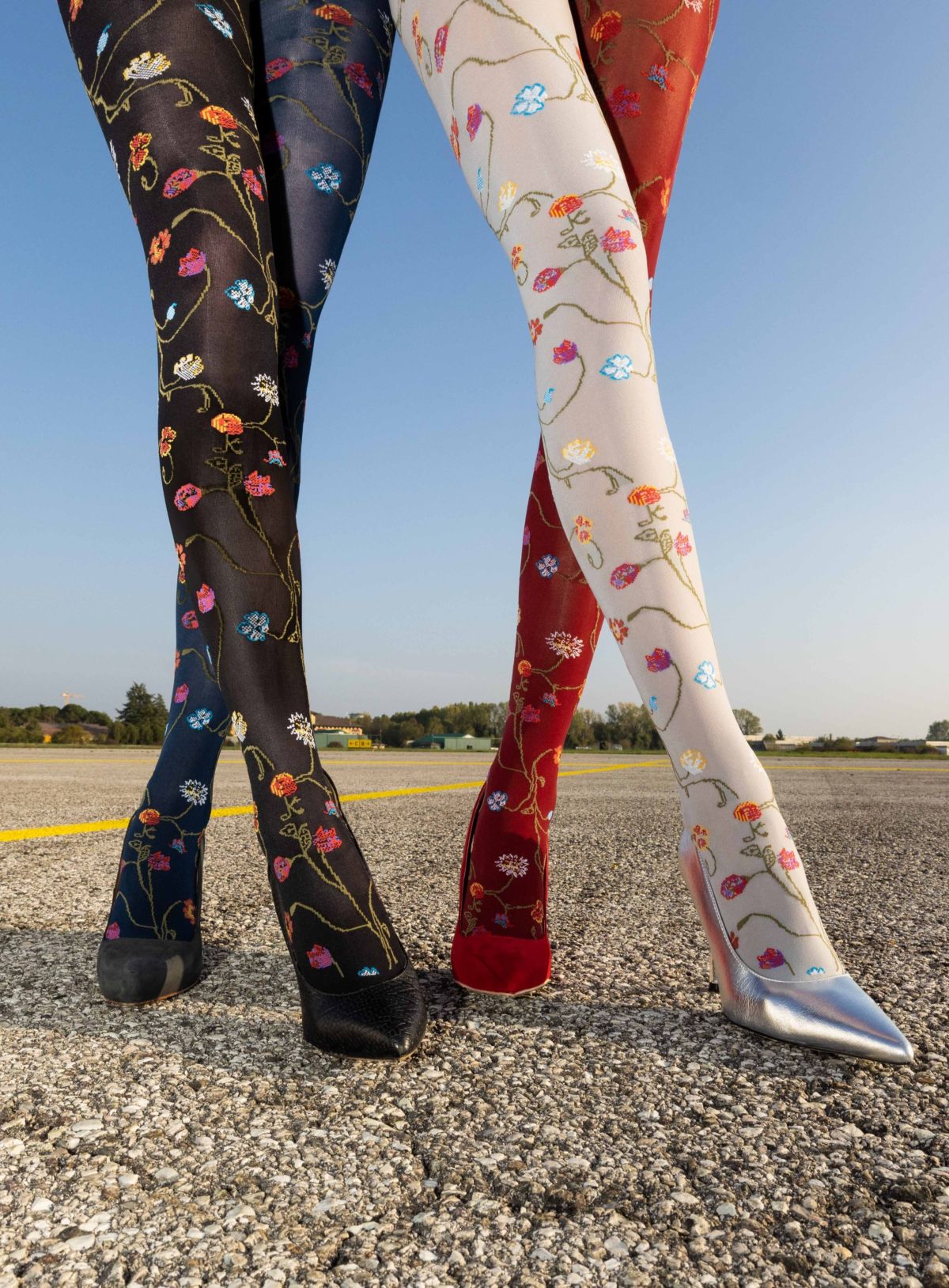 Trasparenze Platino Collant - soft opaque fashion tights with a multicoloured woven floral pattern in black, navy, maroon red and light grey.