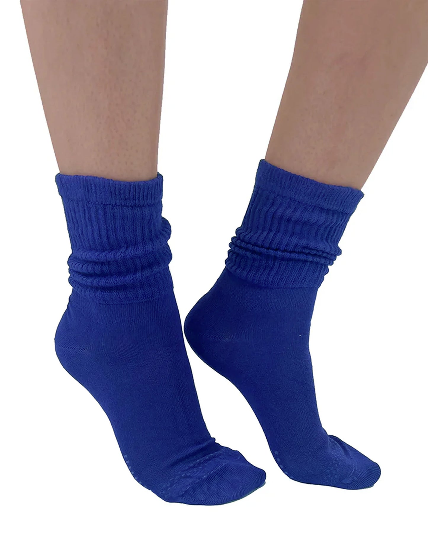 Blue socks worn on a white background