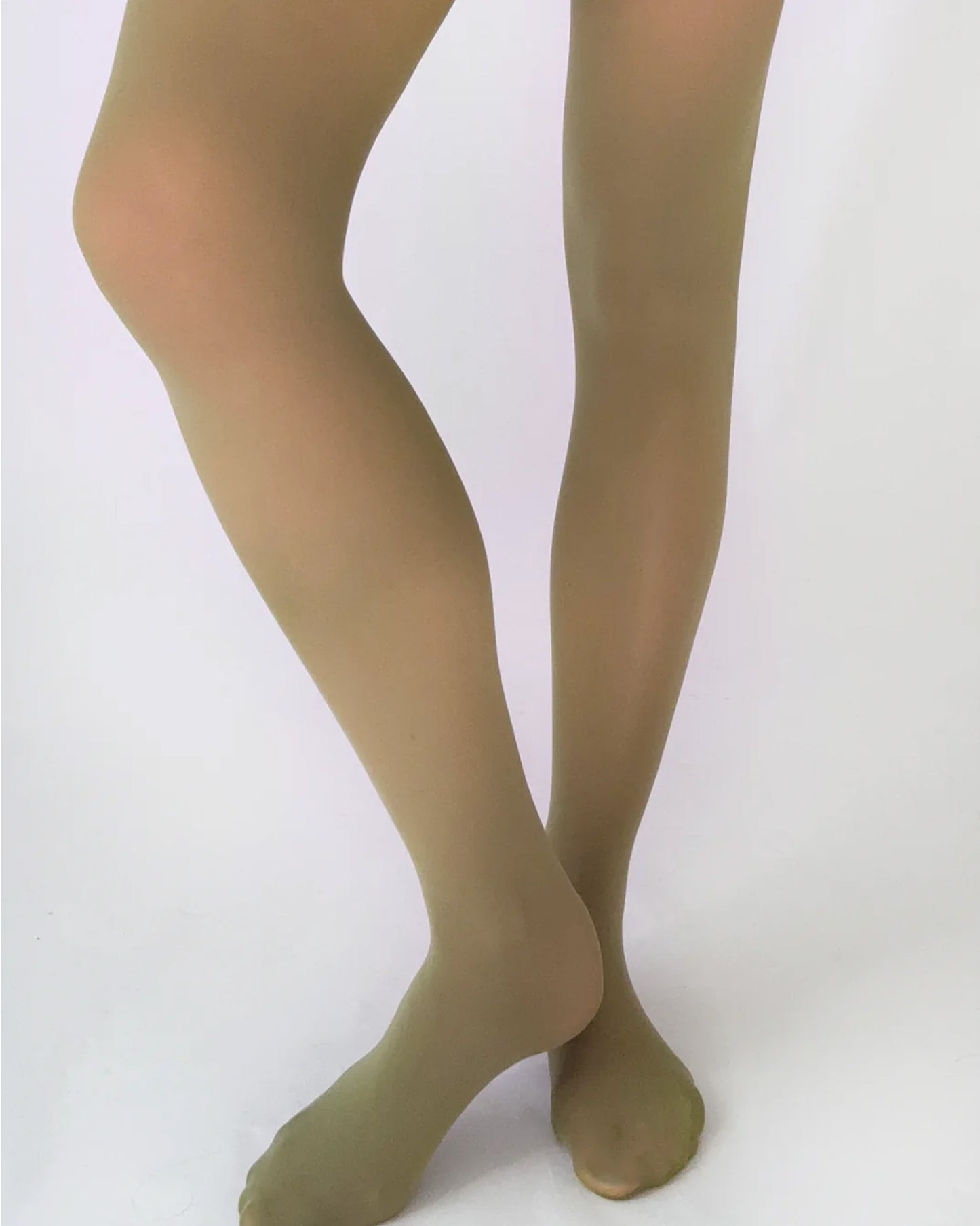 light khaki green tights worn by a person on a white background