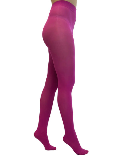 A side view of a model wearing opaque magenta pink tights against a solid white background.