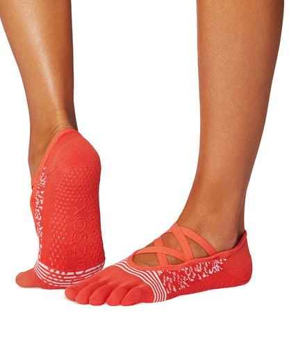 Orange toe-separated socks worn on feet with a white background