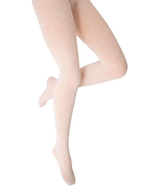 A pair of light ivory tights with a subtle geometric diamond pattern, shown on a model's legs against a solid white background.