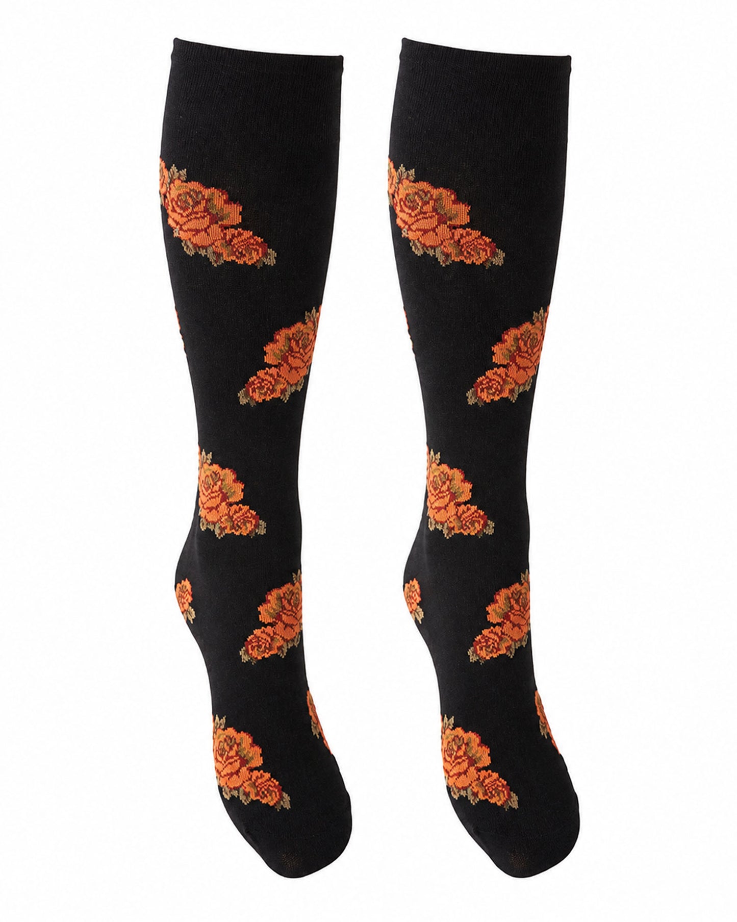 A pair of black knee-high socks with a repeating orange and brown rose pattern, displayed against a plain white background.