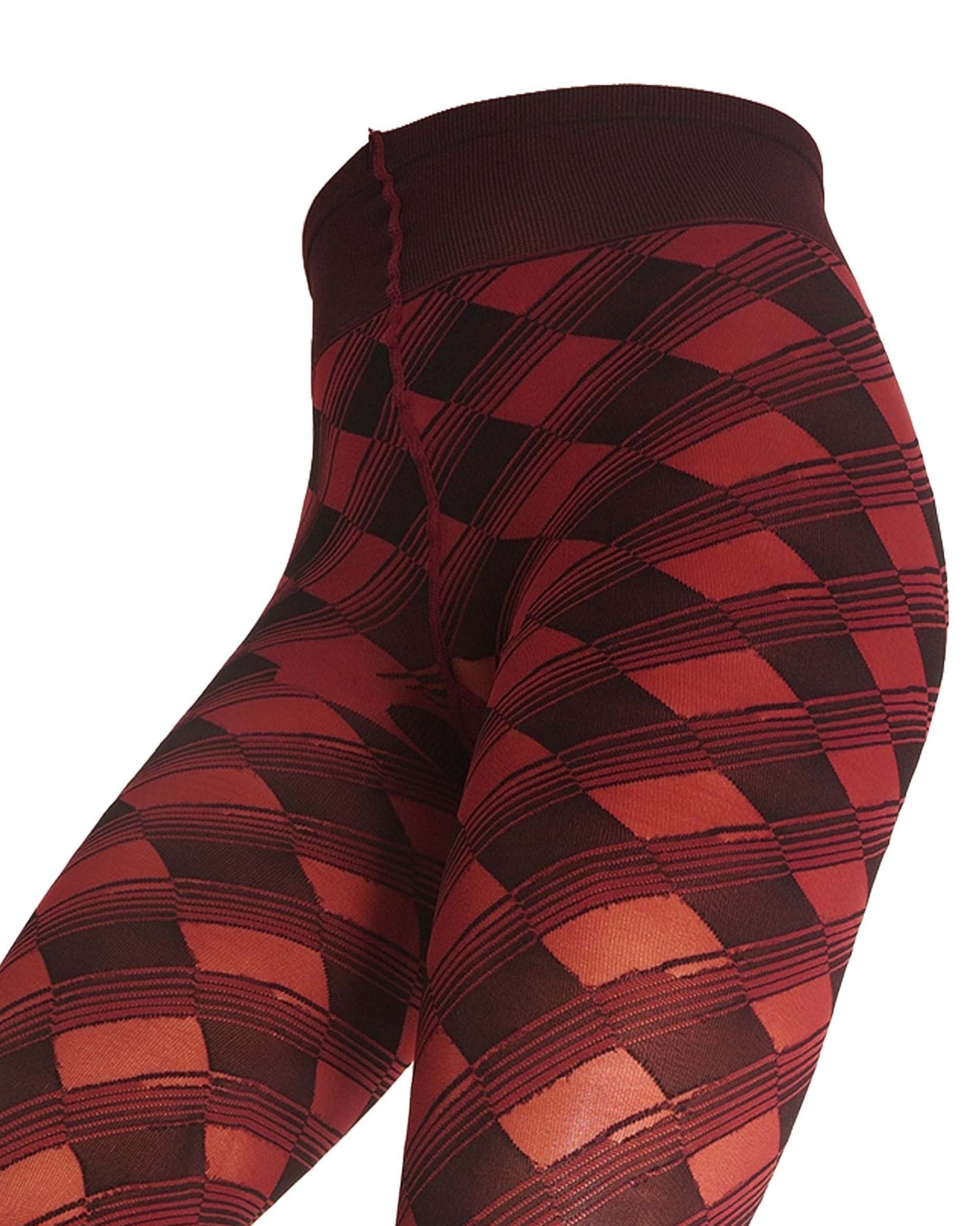 Close-up of a pair of tights with a red and black argyle pattern, shown on a model against a white background.