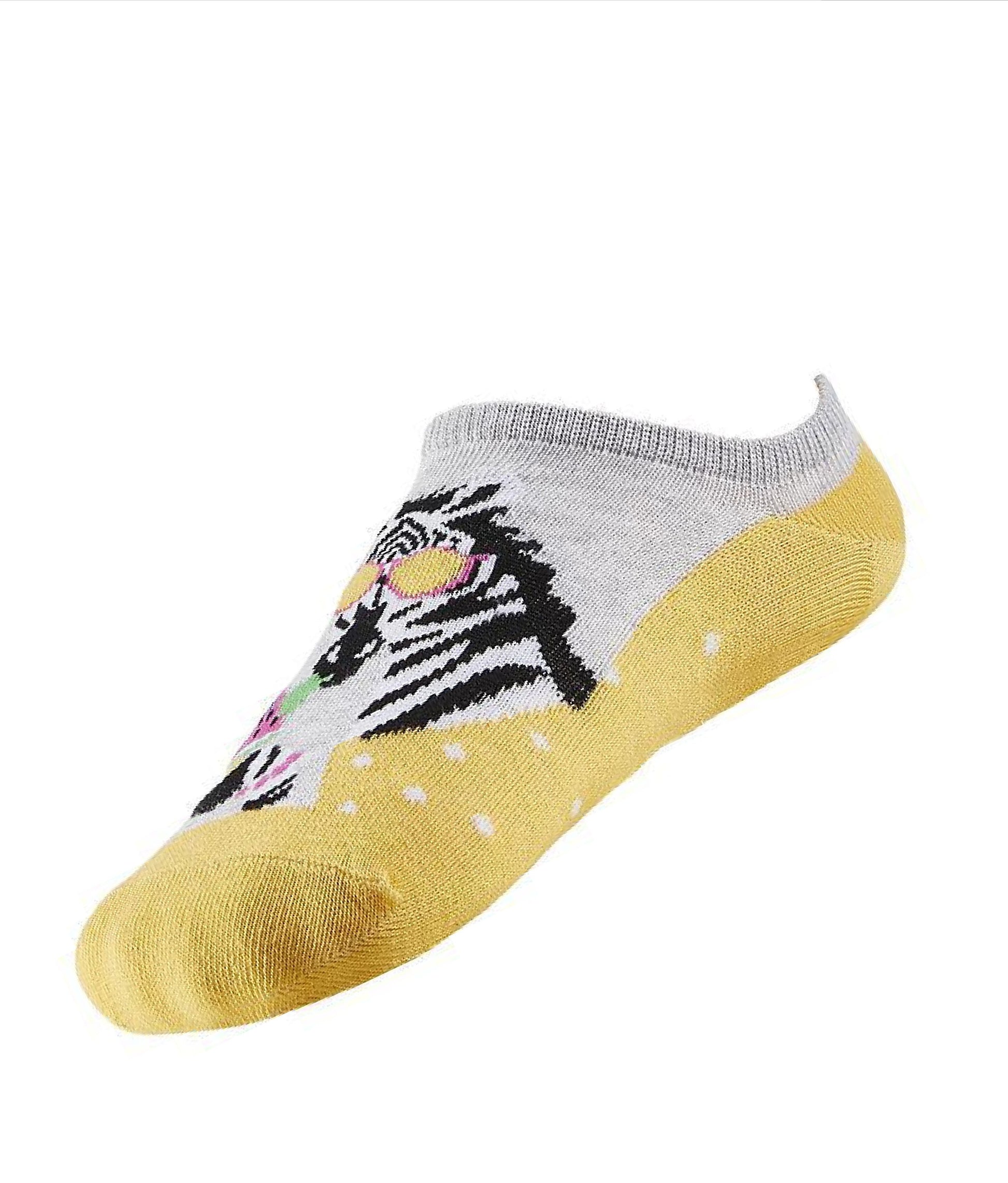 Ysabel Mora Zebra Low Sock - Light grey low ankle cotton sneaker no show socks with a yellow sole and zebra motif wearing shades and sipping a cocktail.