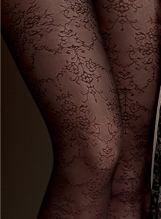 Sheer fashion tights with a light lace style pattern, flat seams, hygienic gusset and deep comfort waist band. Available in brown and teal blue.