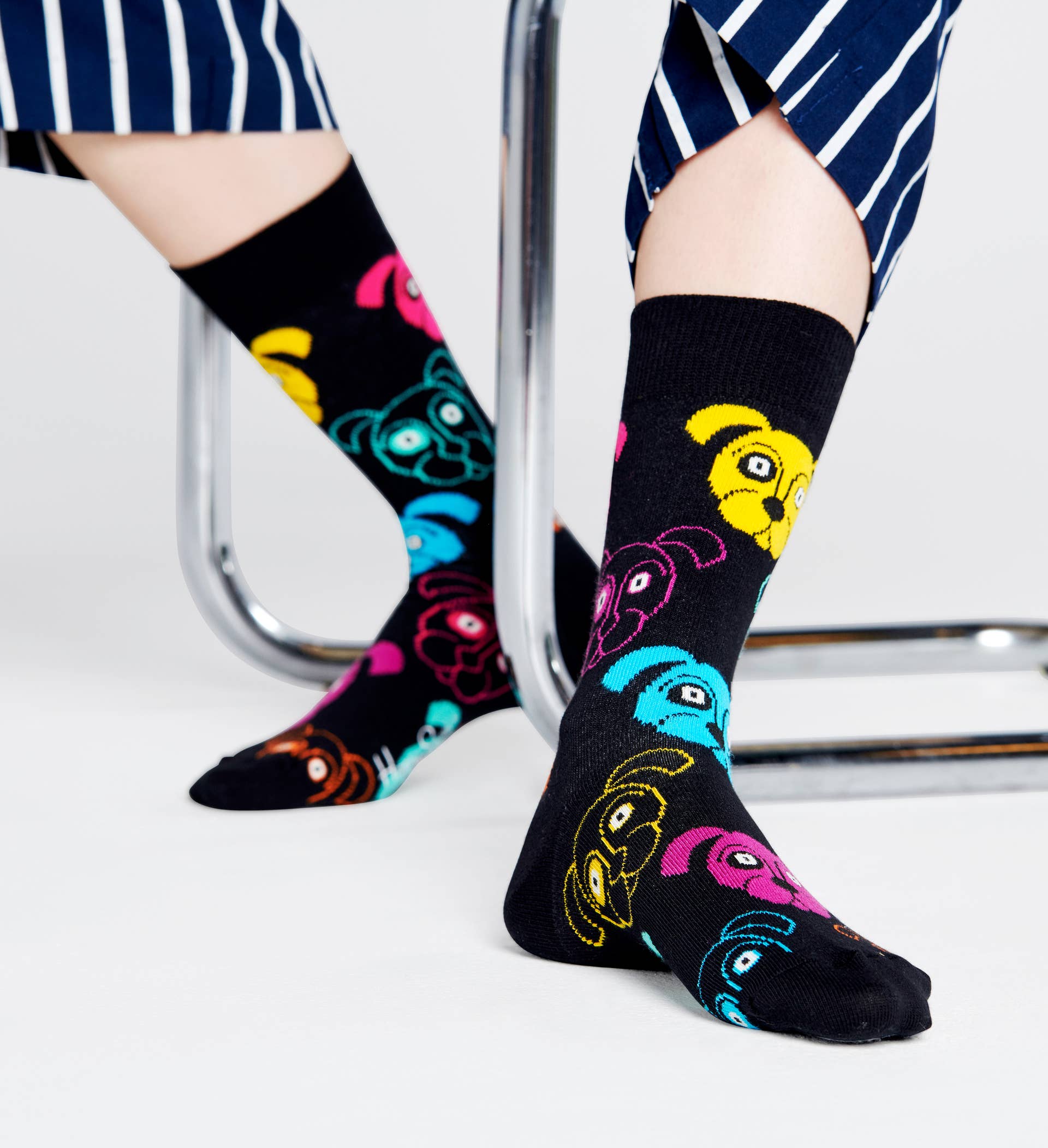 Happy Socks DOG01-9001 Dog Sock - Black cotton socks with multicoloured cartoon dog faces pattern. Available in men and women's sizes.
