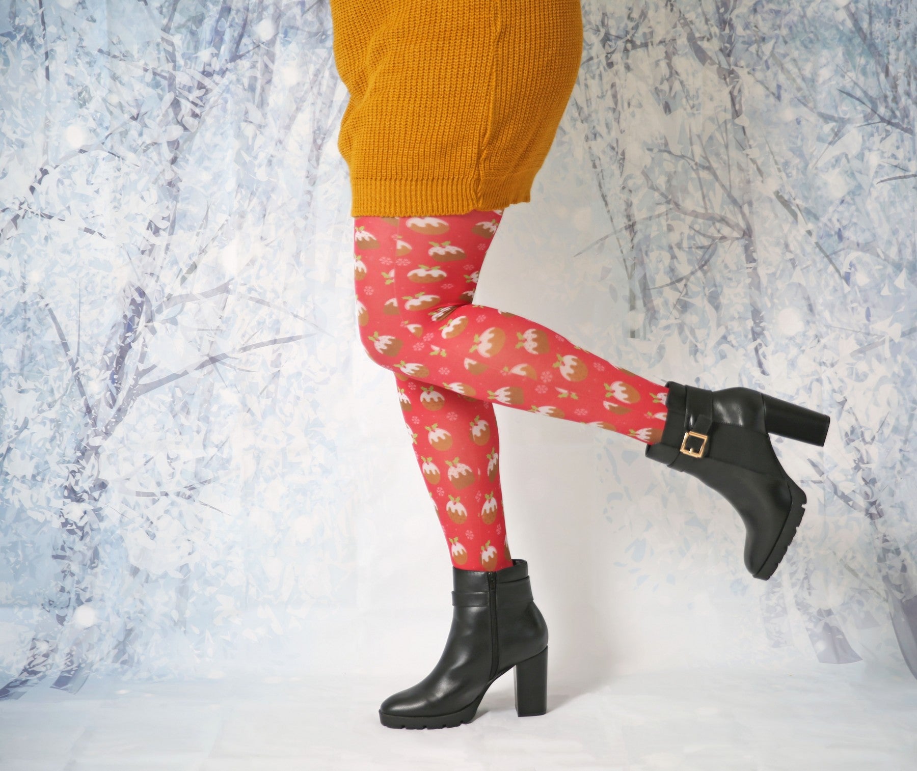 Pamela Mann Christmas Pudding Tights - Printed novelty Xmas tights with an all over Xmas pudding print pattern on a bright red background.