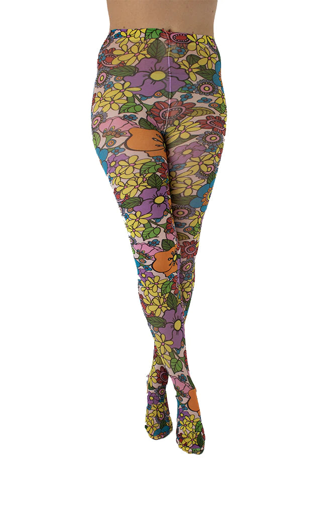 Pamela Mann Flower Power Tights - Pale pink opaque tights with a sixties style flower print pattern in bright shades of purple, yellow, blue, red, pink, orange and outlined in black.