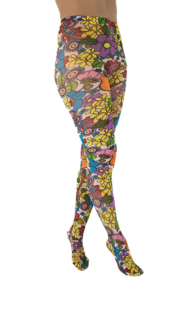 Pamela Mann Flower Power Tights - Pale pink opaque tights with a sixties style flower print pattern in bright shades of purple, yellow, blue, red, pink, orange and outlined in black.