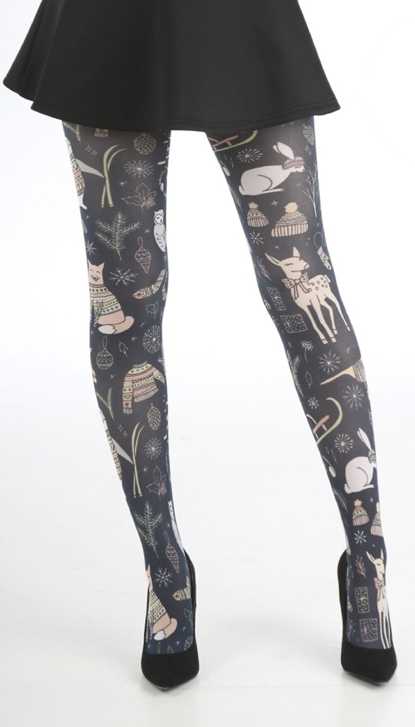 Pamela Mann Christams Woodland Animals - Printed Christmas tights with cute all over illustrated animals including, deer, penguins, foxes, rabbits, owls etc. on a black background.