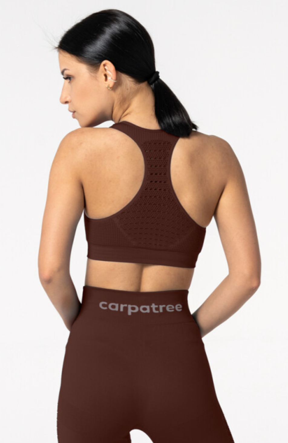 Carpatree Phase Seamless Bra - Burgundy seamless sports bra with removable padding and razor back with crochet style detail.
