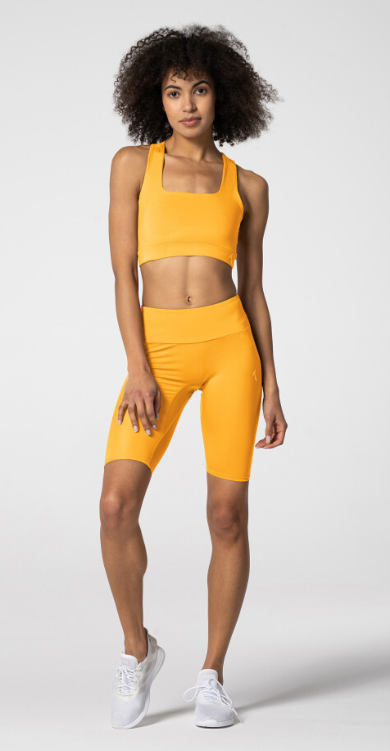 Carpatree Spark Biker Shorts - Yellow semi seamless biker sports with a high deep waistband and gusset. Made of soft and strong quick-drying breathable fabric, letting you train effectively and comfortably.