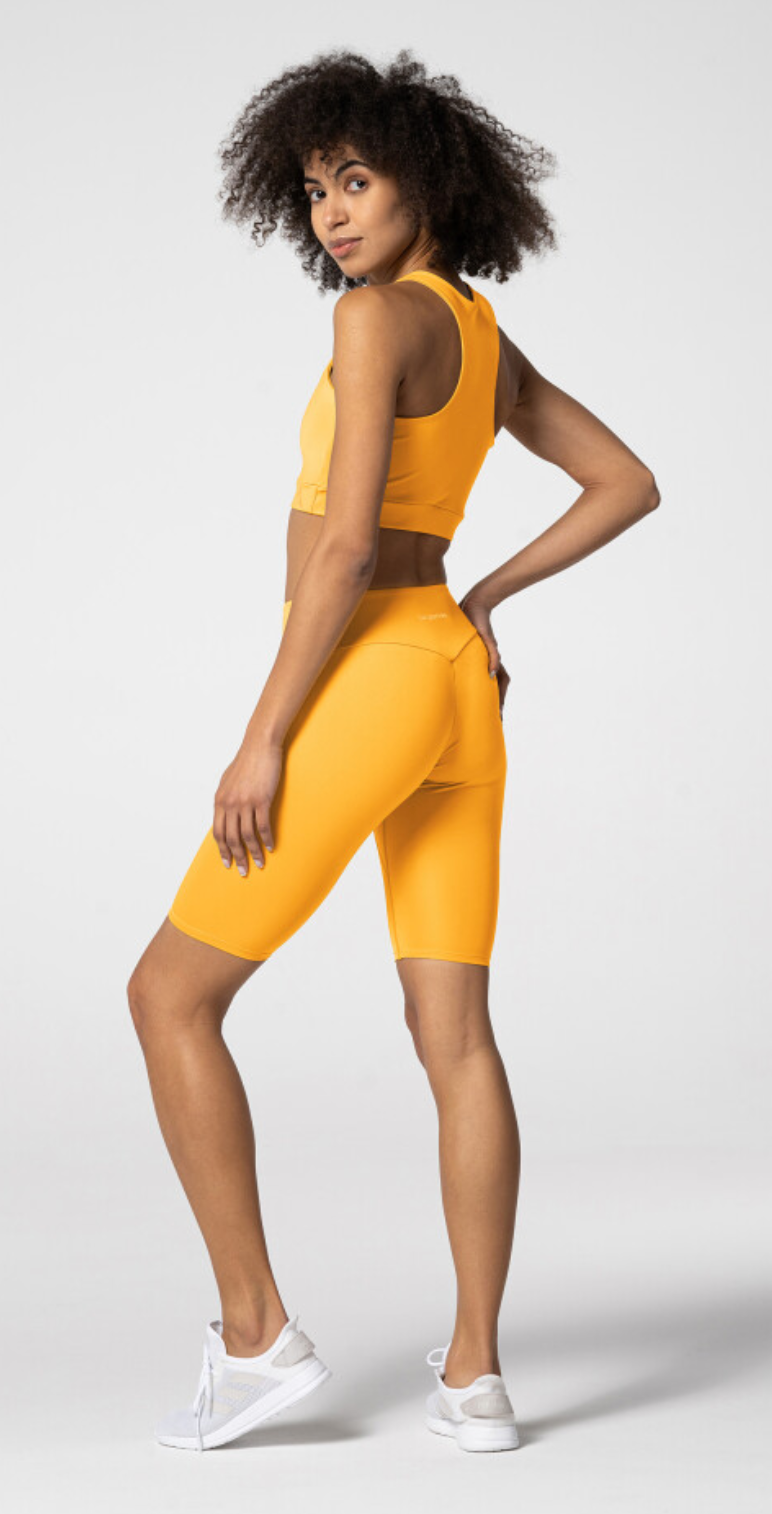 Carpatree Spark Biker Shorts - Yellow semi seamless biker sports with a high deep waistband and gusset. Made of soft and strong quick-drying breathable fabric, letting you train effectively and comfortably.