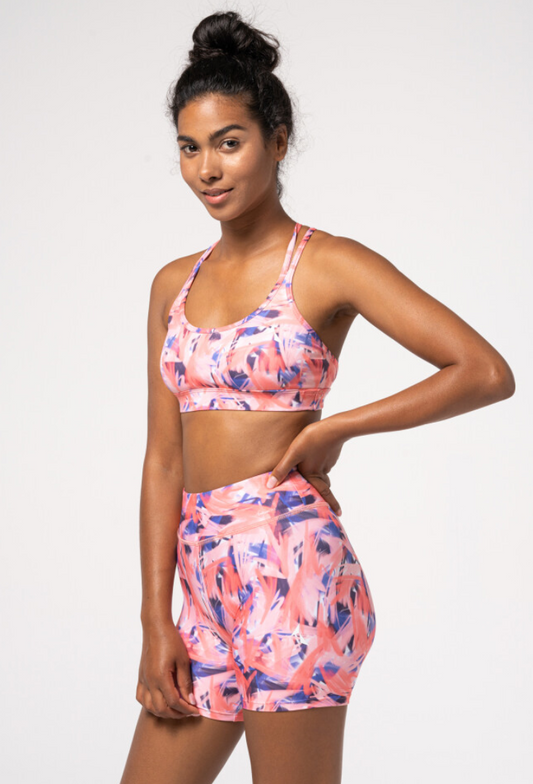 Carpatree Impression Lily Print Bra - Sports bra top with an abstract brush stroke style printed pattern in shades of pink, blue and lilac, double elasticated criss-cross back straps and removable padding. Made of breathable quick drying EnduraFlex fabric these shorts have flat seams are soft and stretchy allowing you to train effectively and comfortably.