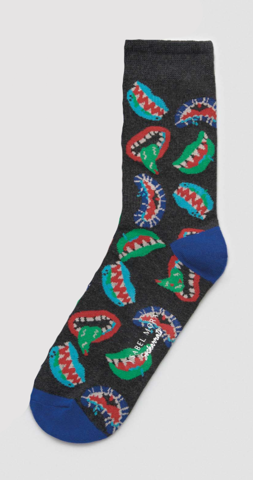 Dark grey cotton crew length socks with an all over scary mouth pattern in shades of blue, green, red and white, blue heel and toe, perfect for halloween.