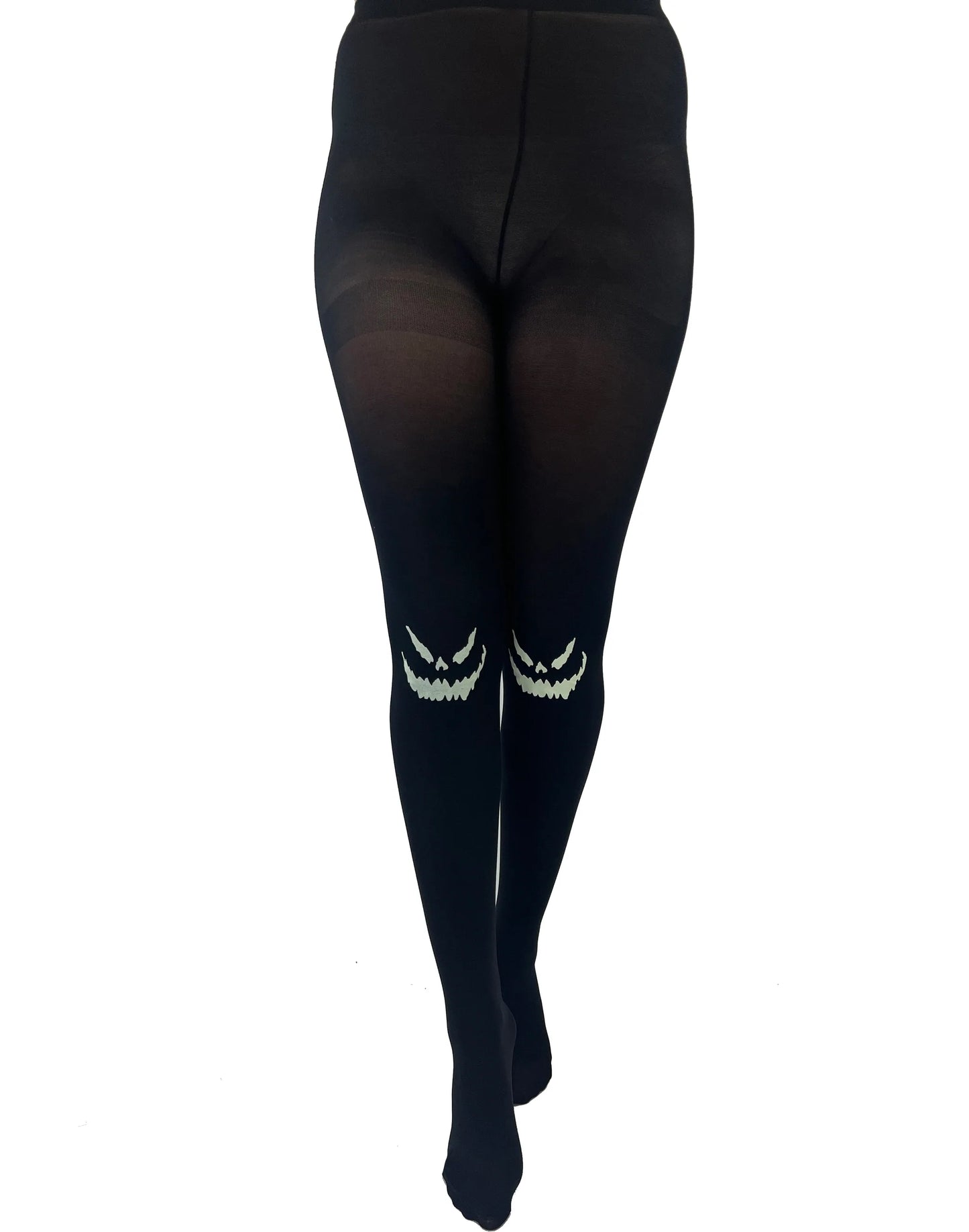 Pamela Mann Spooky Face Tights - Black opaque tights with a glow in the dark Jack-o'-lantern style face on the knees, perfect for Halloween.