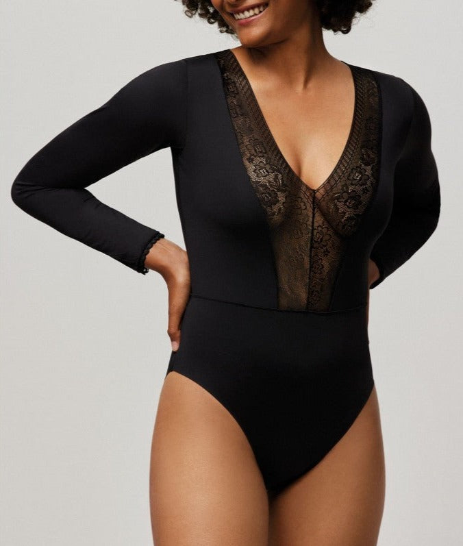 Ysabel Mora 10093 Lace Trim bodysuit - Black long sleeved v-neck body top with a floral lace panelled front, lace cuff trim and two rows of adjustable hook and eye fasteners.
