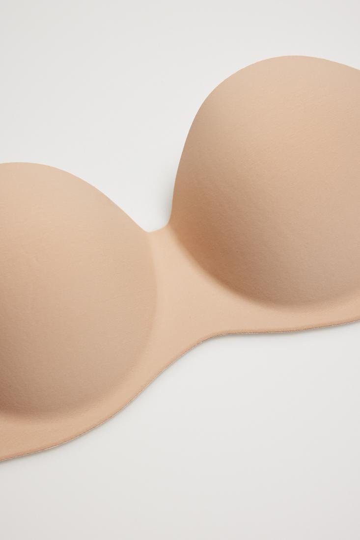 Ysabel Mora 10142 Adhesive Bra - Light push-up reusable adhesive bra. This bra is strapless and backless and adheres to the chest and sides, ideal for dresses and open back tops.