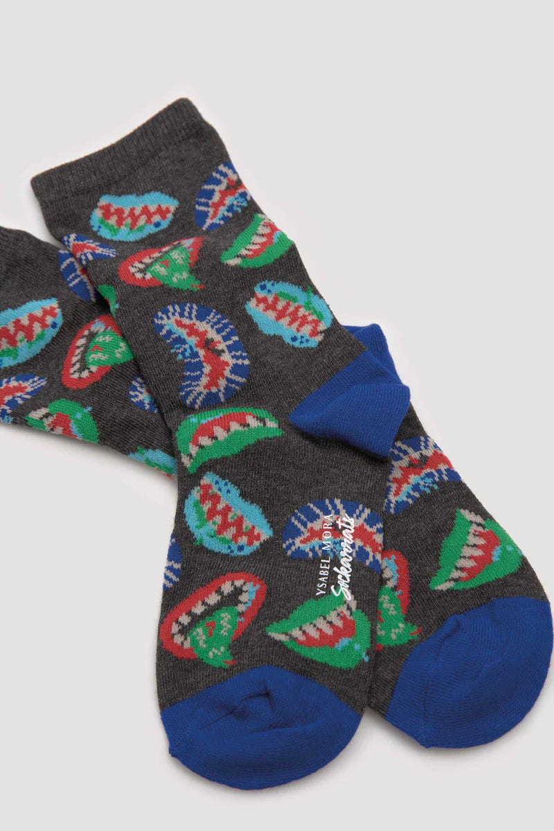 Dark grey cotton crew length socks with an all over scary mouth pattern in shades of blue, green, red and white, blue heel and toe, perfect for halloween.
